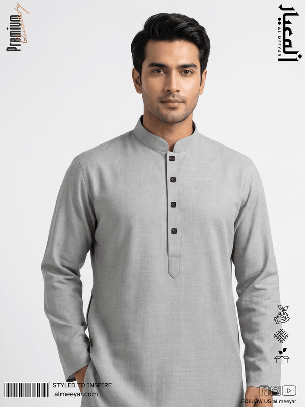 Man wearing a gray kurta with black buttons on a white background